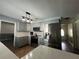 Modern kitchen with stainless steel appliances and gray cabinets at 6750 Winterset Gardens Rd, Winter Haven, FL 33884
