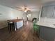 Eat-in kitchen with butcher block island and access to backyard at 6750 Winterset Gardens Rd, Winter Haven, FL 33884