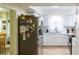 Modern kitchen with white cabinets and stainless steel appliances at 15 Winterset Dr, Winter Haven, FL 33884