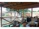 Spacious screened porch overlooking the backyard at 15 Winterset Dr, Winter Haven, FL 33884