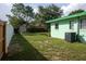 Backyard with shed and green grass at 15 Winterset Dr, Winter Haven, FL 33884