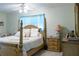 Main bedroom with a large bed and plenty of light at 15 Winterset Dr, Winter Haven, FL 33884