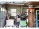 Attached garage with ample storage and workbench at 15 Winterset Dr, Winter Haven, FL 33884