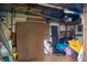 Unfinished basement with various storage items at 15 Winterset Dr, Winter Haven, FL 33884