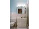 Light and airy bathroom with updated fixtures and vanity at 15 Winterset Dr, Winter Haven, FL 33884