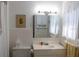 Clean bathroom with vanity, toilet, and shower at 15 Winterset Dr, Winter Haven, FL 33884