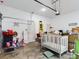 Spacious garage with room for storage and a crib at 169 Violet Ct, Kissimmee, FL 34759