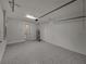 Garage with extra storage and access to bathroom at 213 Cordova Rd, Auburndale, FL 33823