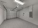 Spacious garage with epoxy floor and storage at 213 Cordova Rd, Auburndale, FL 33823