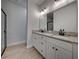 Bathroom with double vanity and granite countertops at 213 Cordova Rd, Auburndale, FL 33823