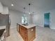 Kitchen island with granite countertops and stainless steel sink at 213 Cordova Rd, Auburndale, FL 33823