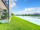 Stunning waterfront view with lush landscaping and a peaceful setting at 2505 Salzburg Loop, Winter Haven, FL 33884