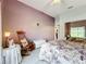 Bedroom with queen bed and access to bathroom at 2505 Salzburg Loop, Winter Haven, FL 33884