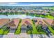 Bird's-eye view of lakefront homes in a community at 2505 Salzburg Loop, Winter Haven, FL 33884