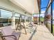 This screened patio offers a peaceful retreat with comfortable seating at 2505 Salzburg Loop, Winter Haven, FL 33884