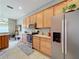 Kitchen boasts stainless steel appliances and ample cabinet space at 2505 Salzburg Loop, Winter Haven, FL 33884