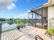 Spacious patio with lake views and plenty of room for outdoor furniture at 2505 Salzburg Loop, Winter Haven, FL 33884