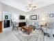 Bright living room featuring a neutral color palette and ample natural light at 2505 Salzburg Loop, Winter Haven, FL 33884