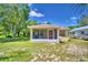 Charming one-story home with a screened porch at 317 C St, Lake Wales, FL 33853