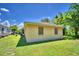 Small yellow building with boarded-up windows at 317 C St, Lake Wales, FL 33853