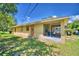 Back of the house showing a screened porch at 317 C St, Lake Wales, FL 33853