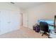 Home office with built-in desk and double door closet at 460 Boardwalk Ave, Haines City, FL 33844