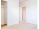 Bedroom with white walls, tan carpet, and a closet at 460 Boardwalk Ave, Haines City, FL 33844