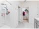 Bathroom with shower and walk-in closet at 460 Boardwalk Ave, Haines City, FL 33844