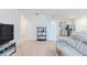Living room with sectional sofa and built-in shelving at 460 Boardwalk Ave, Haines City, FL 33844