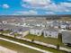 Aerial view of houses in a residential community at 460 Boardwalk Ave, Haines City, FL 33844