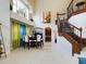 Elegant wooden staircase with wrought iron railings at 5219 Mystic Point Ct, Orlando, FL 32812