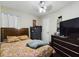 Bright bedroom with a queen-size bed and ample storage at 5219 Mystic Point Ct, Orlando, FL 32812