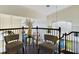 Cozy upstairs sitting area with two comfortable armchairs at 5219 Mystic Point Ct, Orlando, FL 32812