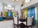 Open concept dining area with seating for six at 5219 Mystic Point Ct, Orlando, FL 32812