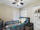 Bedroom with double bed, dresser, and window coverings at 5219 Mystic Point Ct, Orlando, FL 32812