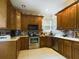 Well-equipped kitchen with ample cabinetry and stainless steel appliances at 5219 Mystic Point Ct, Orlando, FL 32812