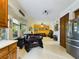 Eat-in kitchen with access to Gathering room at 5219 Mystic Point Ct, Orlando, FL 32812