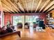 Bright home office with wood floors, built-in shelves, and views of the backyard at 2741 Edwards Rd, Haines City, FL 33844
