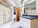 Clean bathroom with updated vanity and shower/tub combo at 2741 Edwards Rd, Haines City, FL 33844