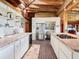 Modern kitchen with stainless steel appliances and tile floor at 2741 Edwards Rd, Haines City, FL 33844