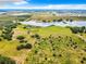 Aerial view of property showing house, land, and surrounding farmlands at 2741 Edwards Rd, Haines City, FL 33844