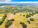 Aerial view of property showing house, land, and surrounding farmlands at 2741 Edwards Rd, Haines City, FL 33844