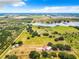 Aerial view of property showing house, land, and surrounding farmlands at 2741 Edwards Rd, Haines City, FL 33844