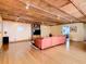 Living room with hardwood floors and exposed wood beams at 2741 Edwards Rd, Haines City, FL 33844