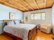Charming bedroom with wood floors and comfy seating area at 2741 Edwards Rd, Haines City, FL 33844