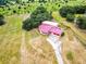 Single-Gathering home with red metal roof on large lot at 2741 Edwards Rd, Haines City, FL 33844