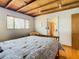 Bright bedroom with wood floors and en-suite bathroom access at 2741 Edwards Rd, Haines City, FL 33844