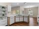 Bright kitchen features ample cabinetry, modern appliances, and wood flooring at 4432 Waterford Dr, Lake Wales, FL 33859