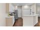 Kitchen with stainless steel appliances and light wood cabinets at 4432 Waterford Dr, Lake Wales, FL 33859