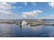 Community boat docks on a calm lake at 4432 Waterford Dr, Lake Wales, FL 33859